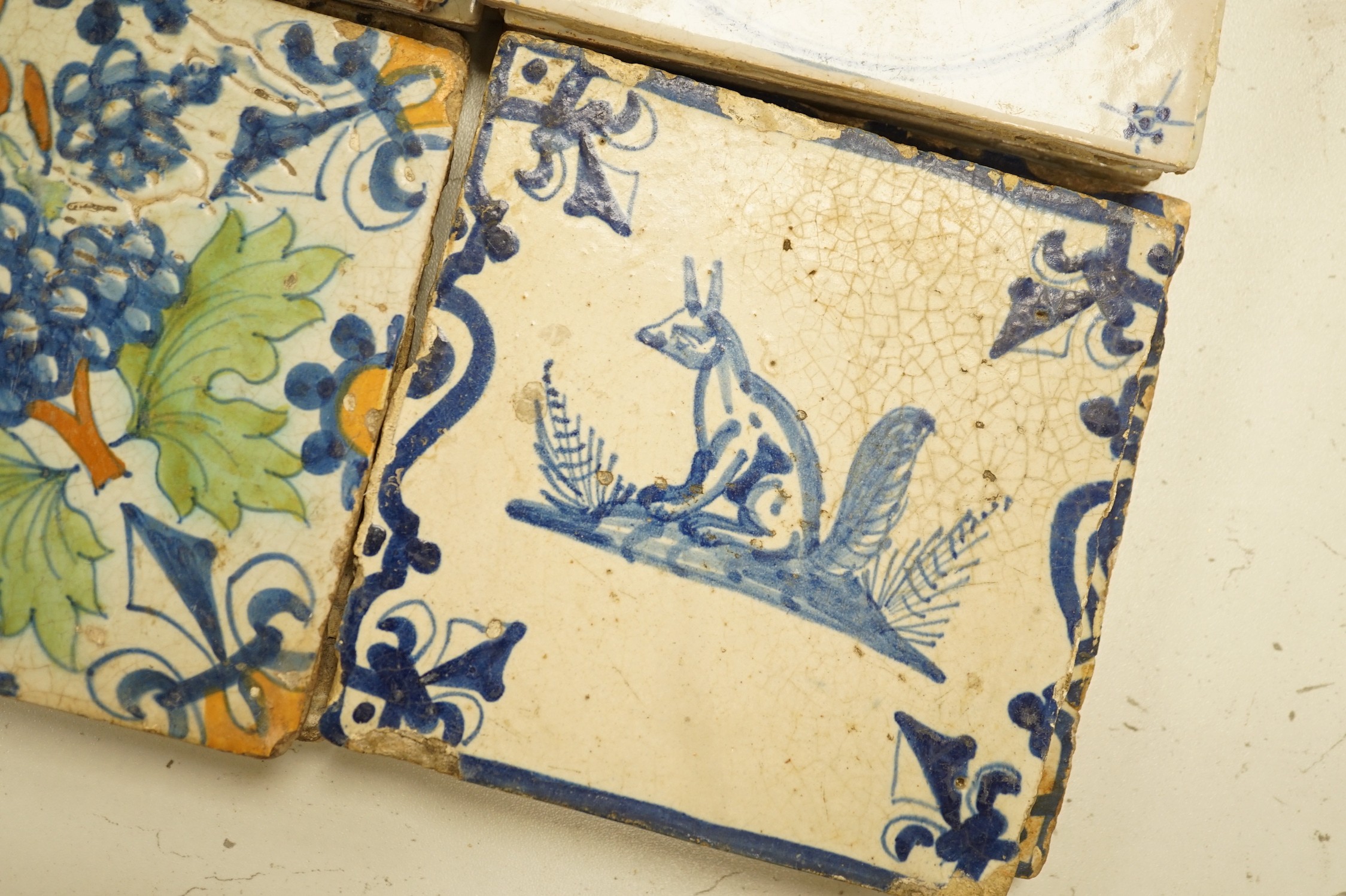 Four 18th century Delft tiles and nine 19th-century Delft blue and white animal tiles(13)